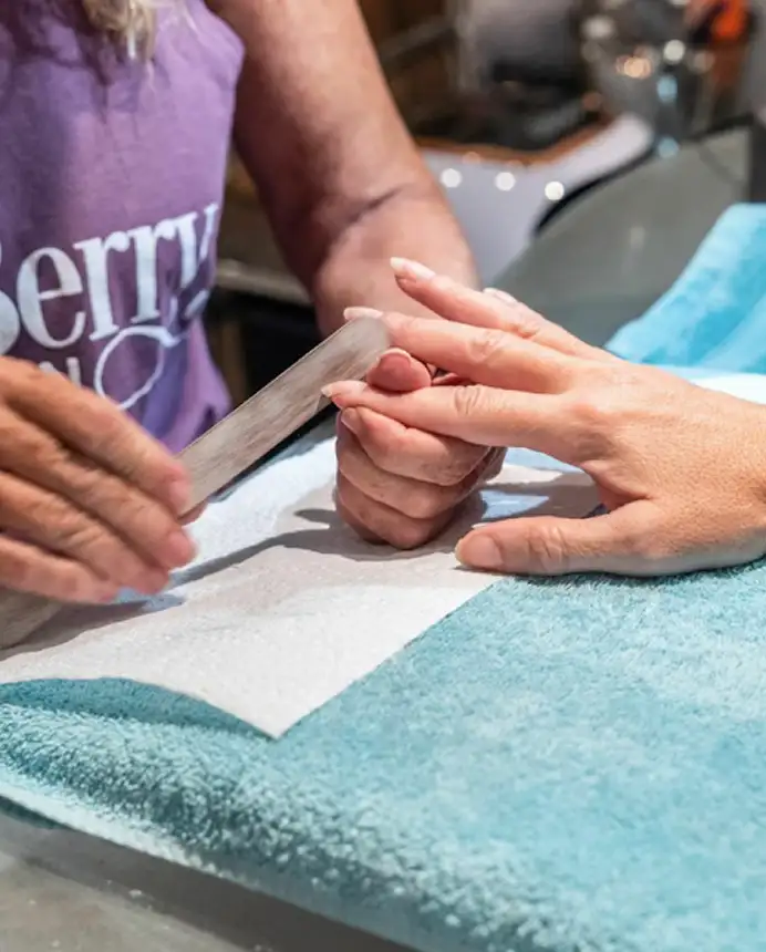 Manicured nails finished at The Wild Berry Salon
